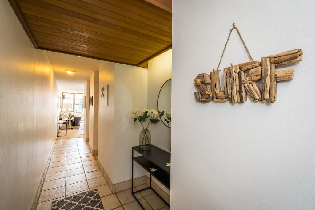 Feel the surf vibe in our stylish hallway, setting the tone for a perfect beach vacation