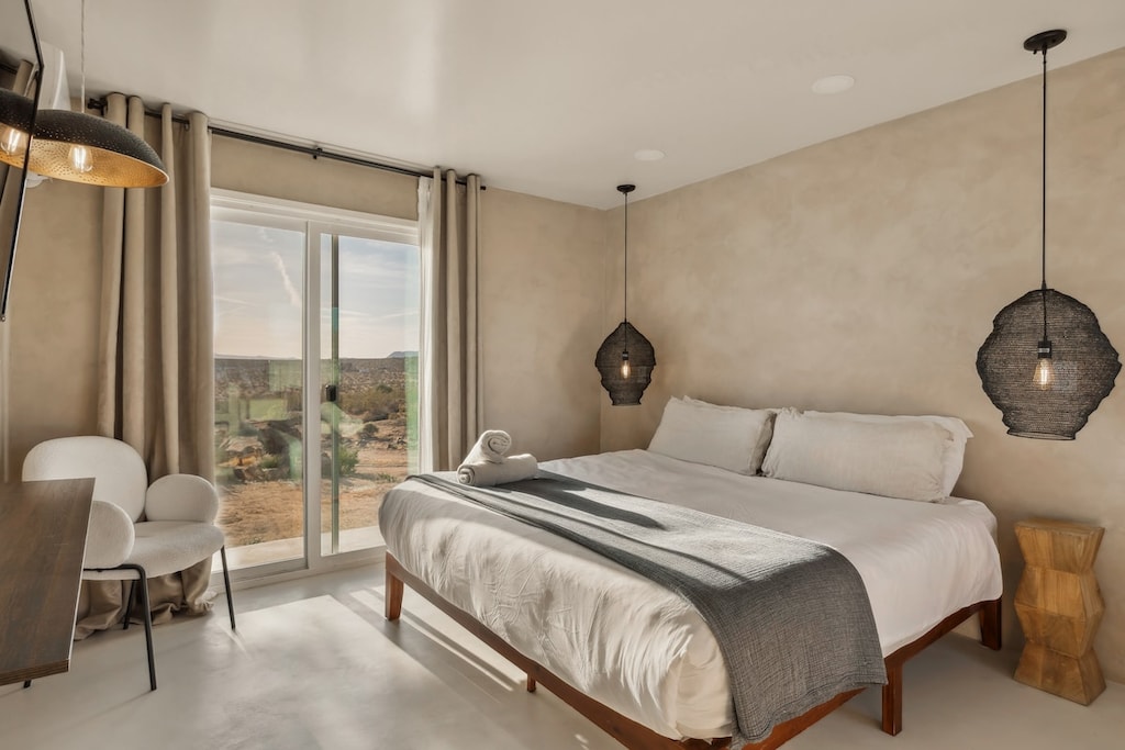 Bedroom 1, king bed and woven pendants