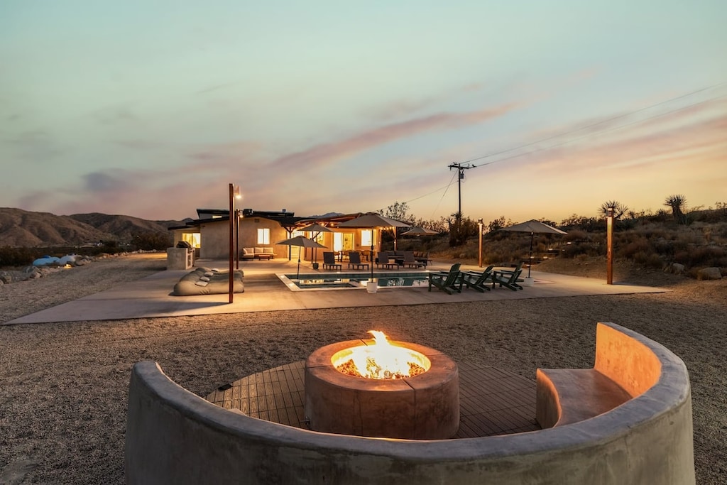 Sunken fire pit lounge at sunset