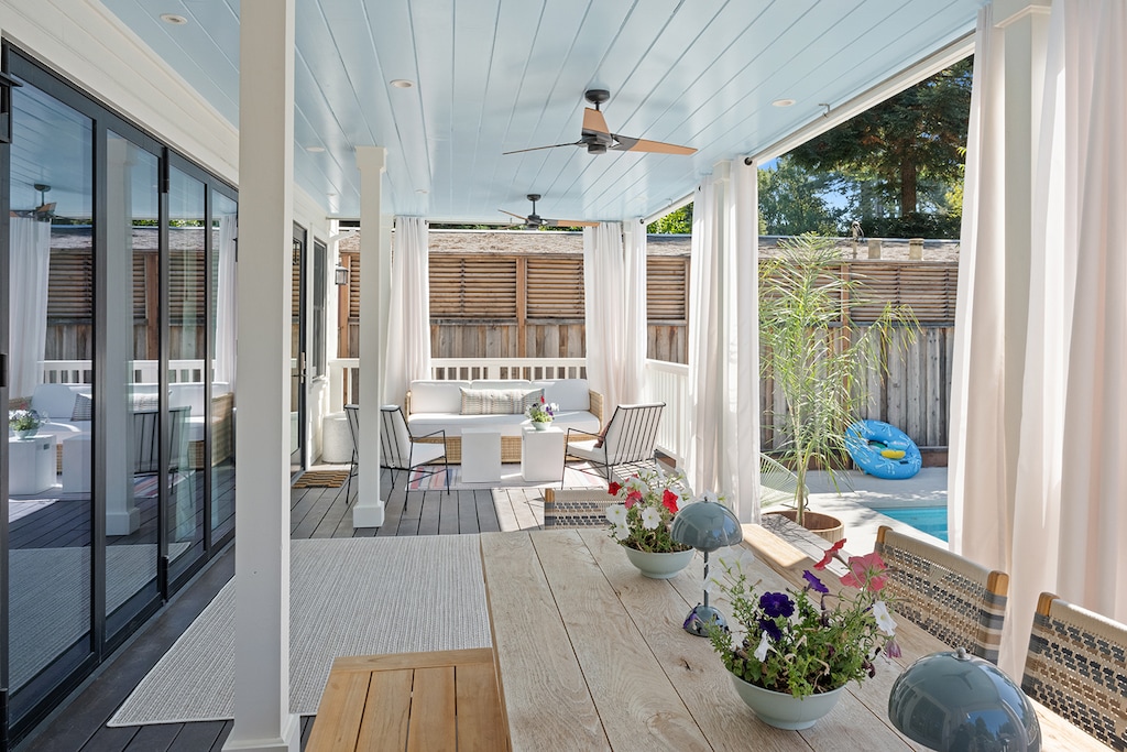Ceiling fans keep air moving around the outdoor seating and dining -comfortable year-round