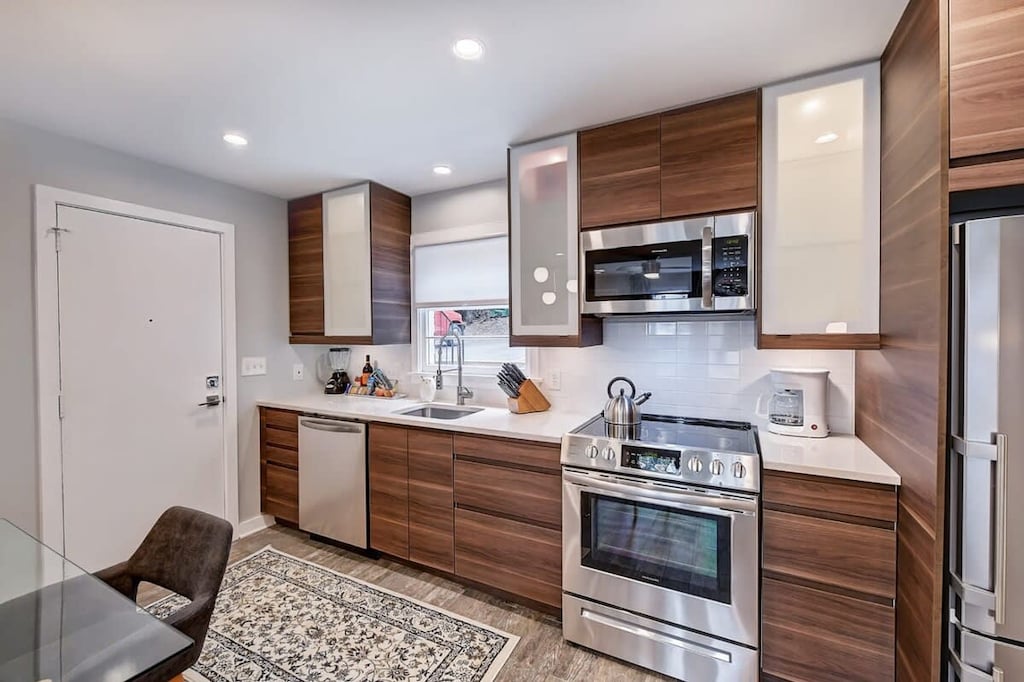 Modern kitchen area with updated appliances