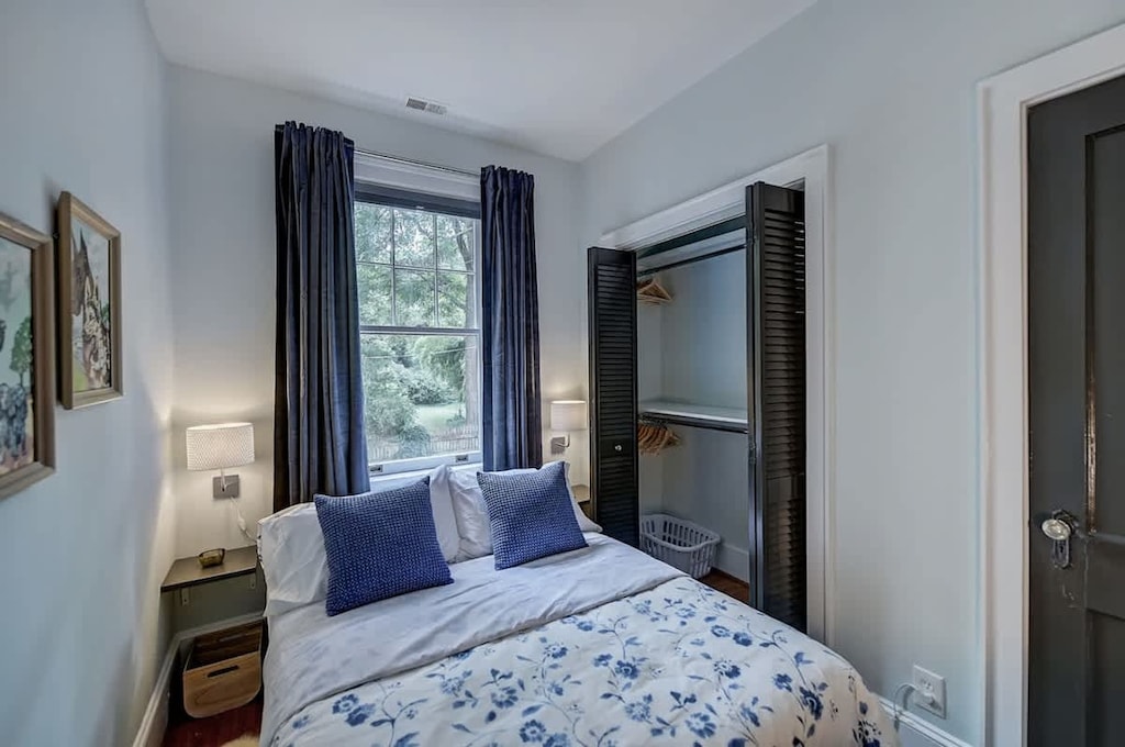 Minimalist bedroom with built-in cabinet