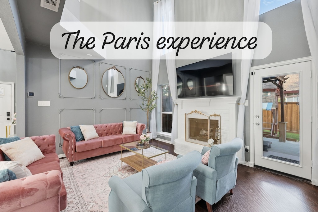 Featuring sleek Parisian-inspired furniture and tasteful designer accents, this is a living room where you can sit back, relax, and put your feet up!