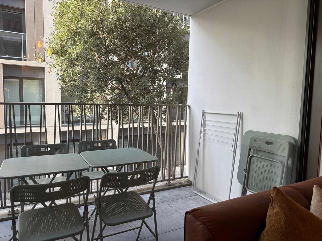 Private balcony with dining set, ideal for fresh air and coffee ☕