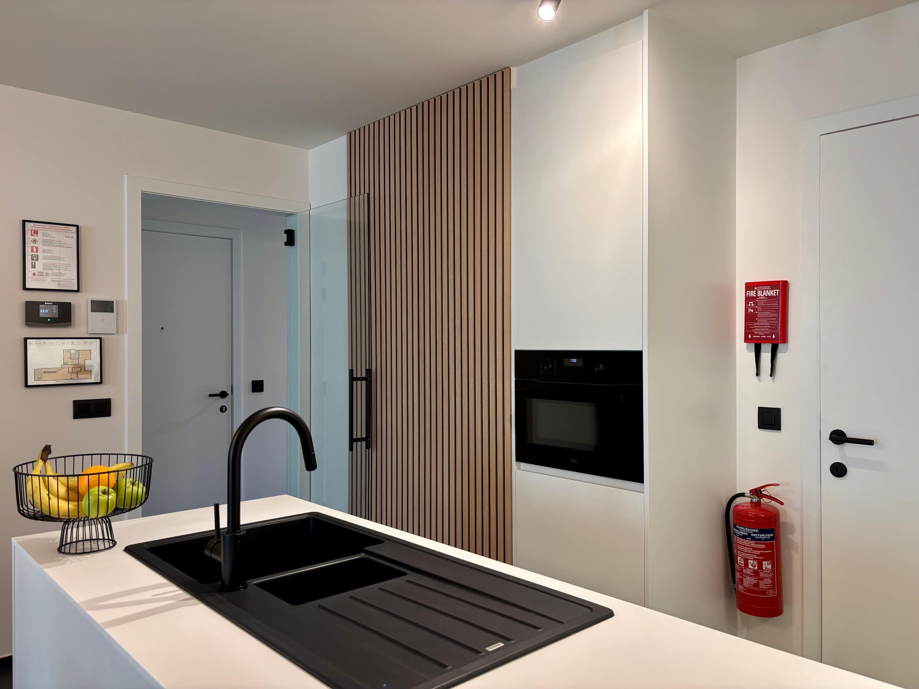 Sleek design and clean lines giving the kitchen a calm, elegant feel