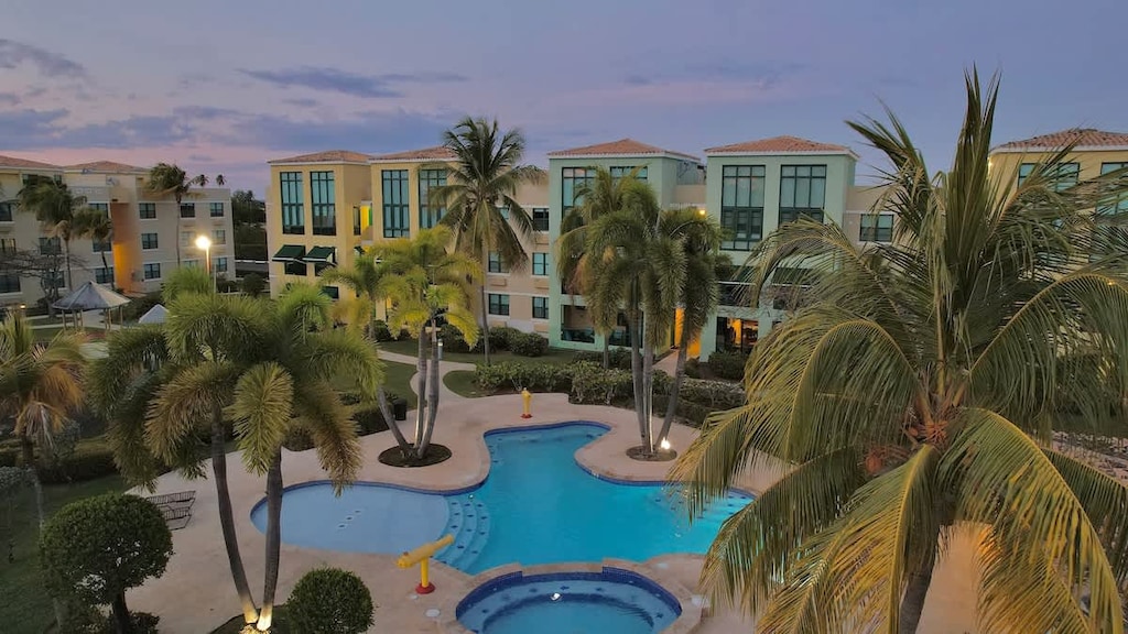 Aquatika is a resort-like beach community that features 5 pools, 2 jacuzzis, lazy river, pool slide, 2 tennis courts, beach volleyball, basketball, mini golf, BBQ facilities, 3 play yard and direct access to the beach.