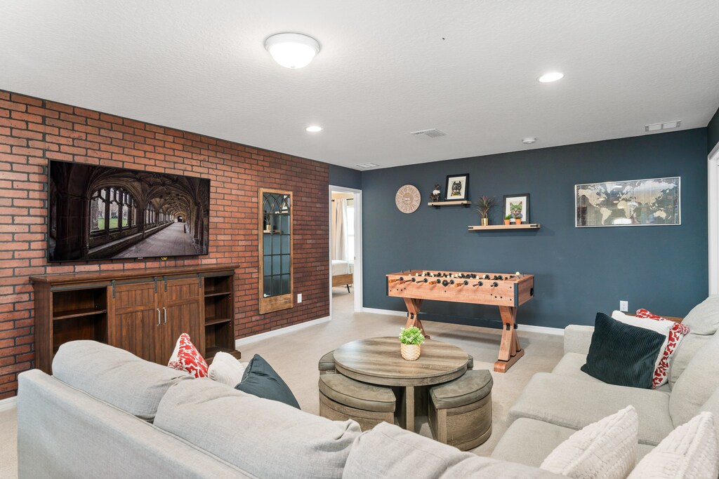 Enjoy a cozy movie night in our second TV room, or challenge your friends to a game of foosball or pool.