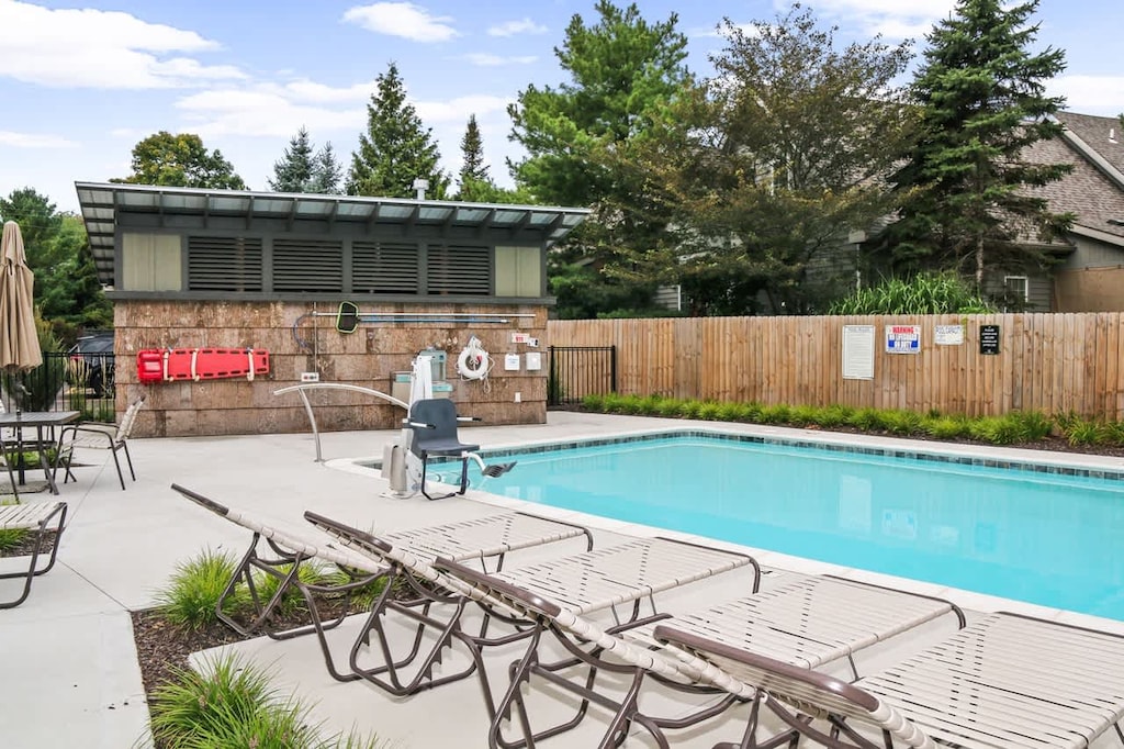 Lounge at the community pool, just steps away from this townhome! The pool is only shared by 15 units in this small community.