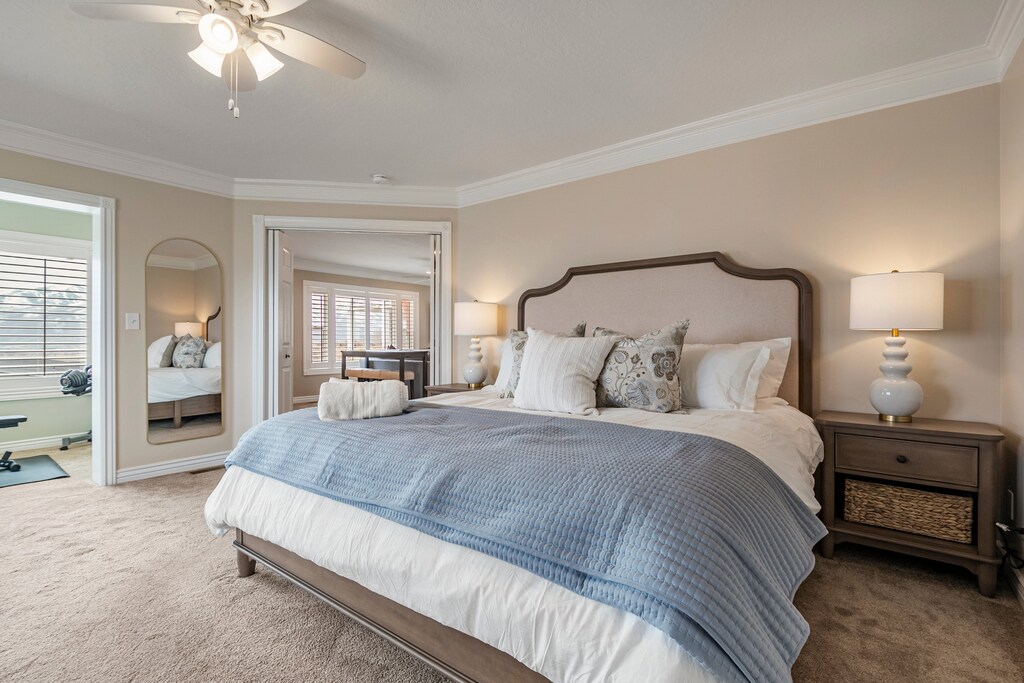 A very large master suite with plush King Bed, sitting area and private nook with light gym equipment.
