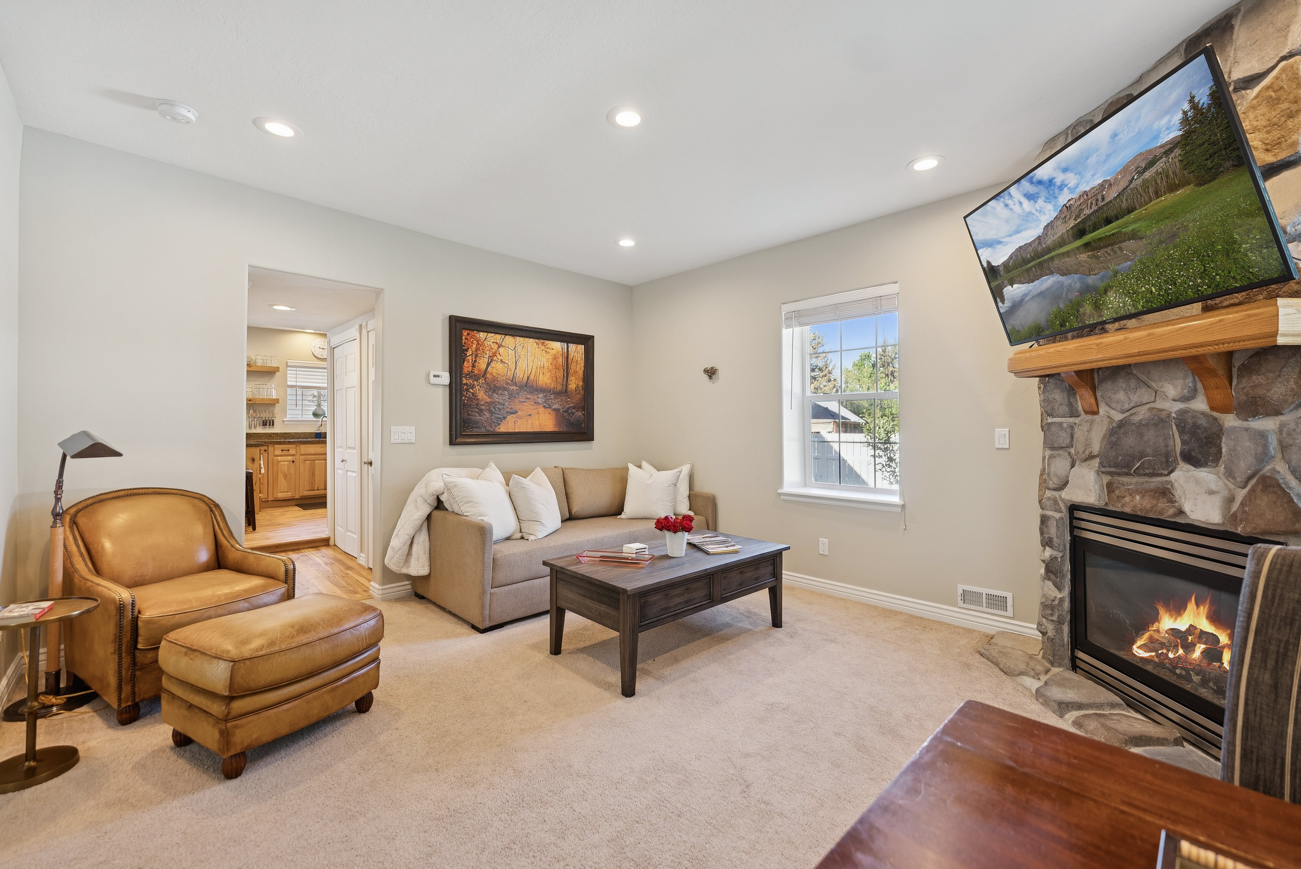 Charming and spacious living room and family room areas with plenty of seating and an indoor fireplace.  Perfect for family & friends gatherings!