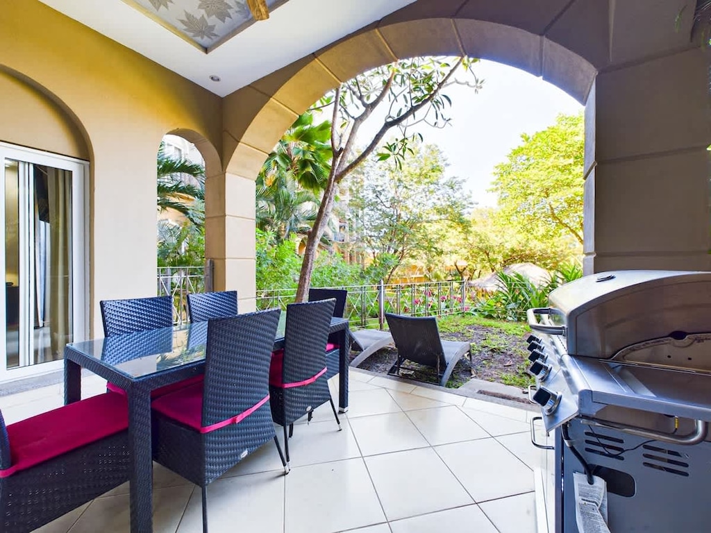 Covered terrace and semi-private garden.