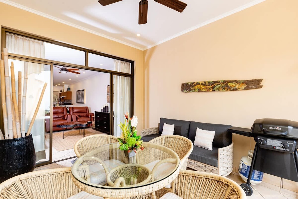 Spacious terrace area with dining and lounge area and gas BBQ