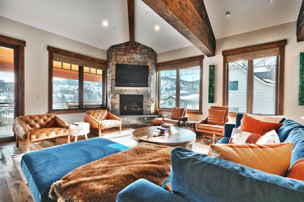 Living room (main floor): Gas fireplace, 70” Smart TV, mini-split A/C