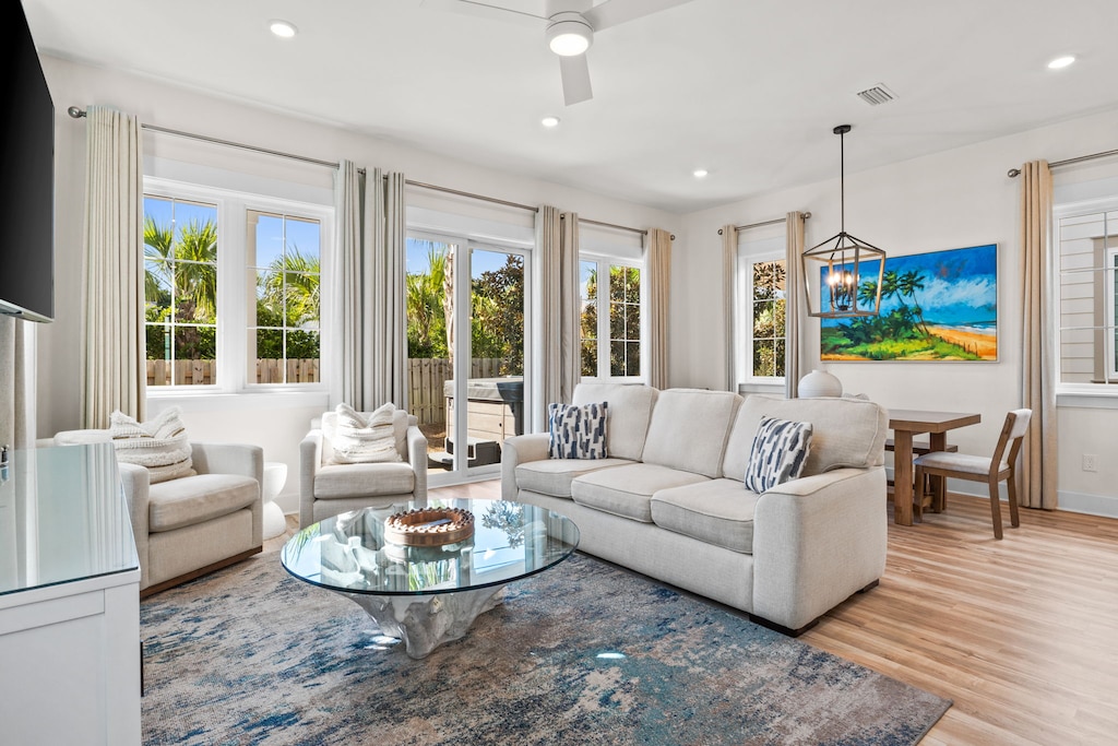 With an open-concept layout that flows seamlessly into the kitchen, it's perfect for entertaining or relaxing with family.