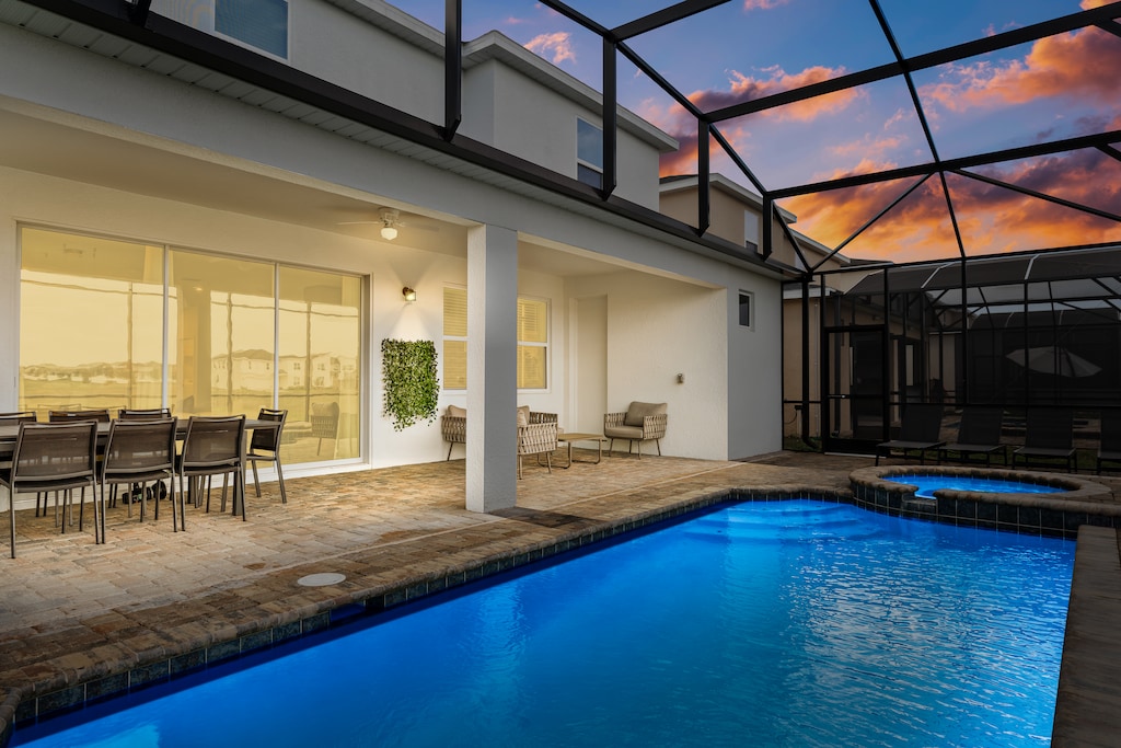 Enjoy lovely evenings outside by the private pool.