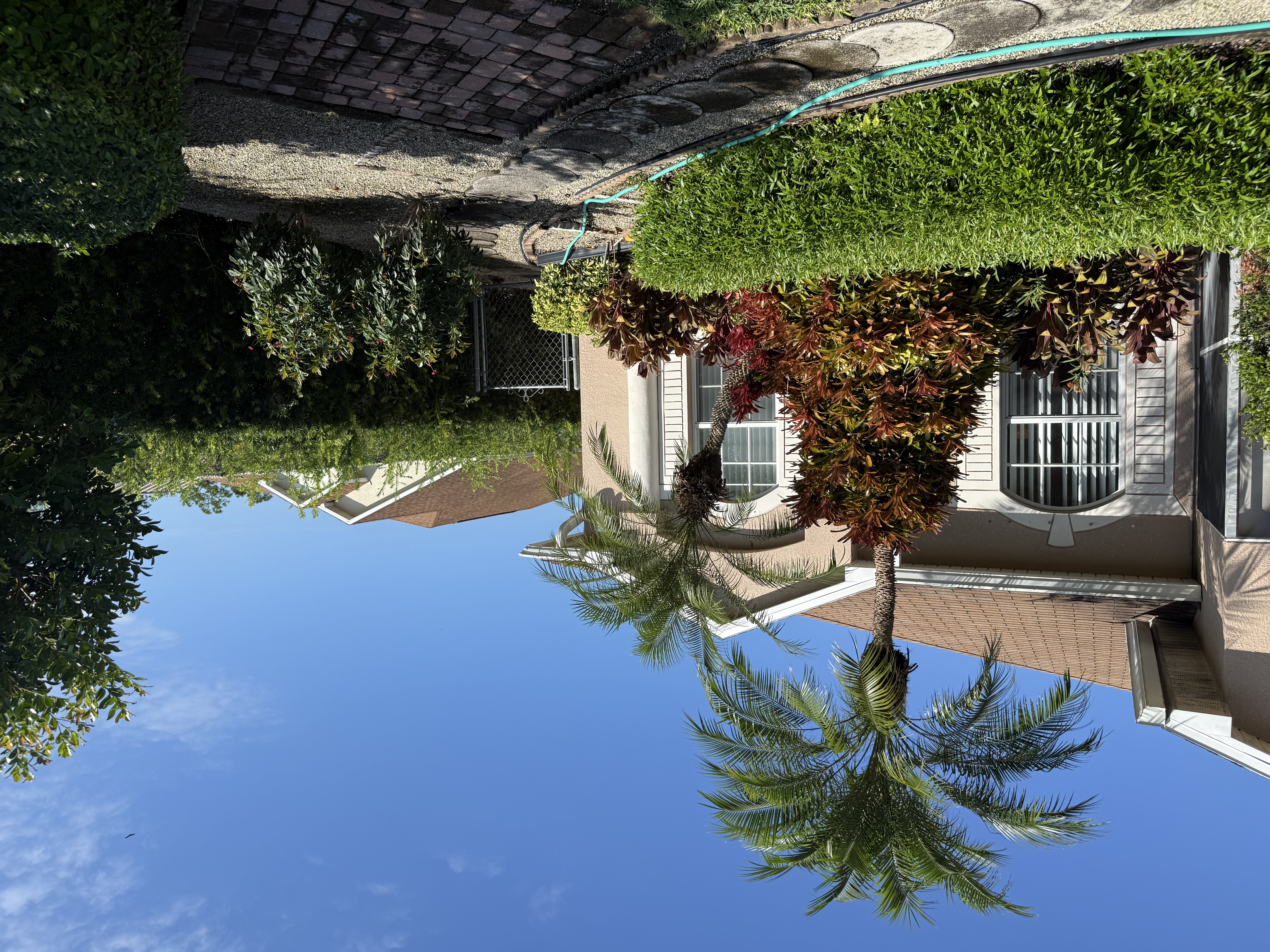 Side paved entrance to pool area