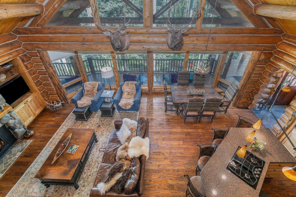 Living Room - View from above showcases the spacious living area and dining area with table seating for 6