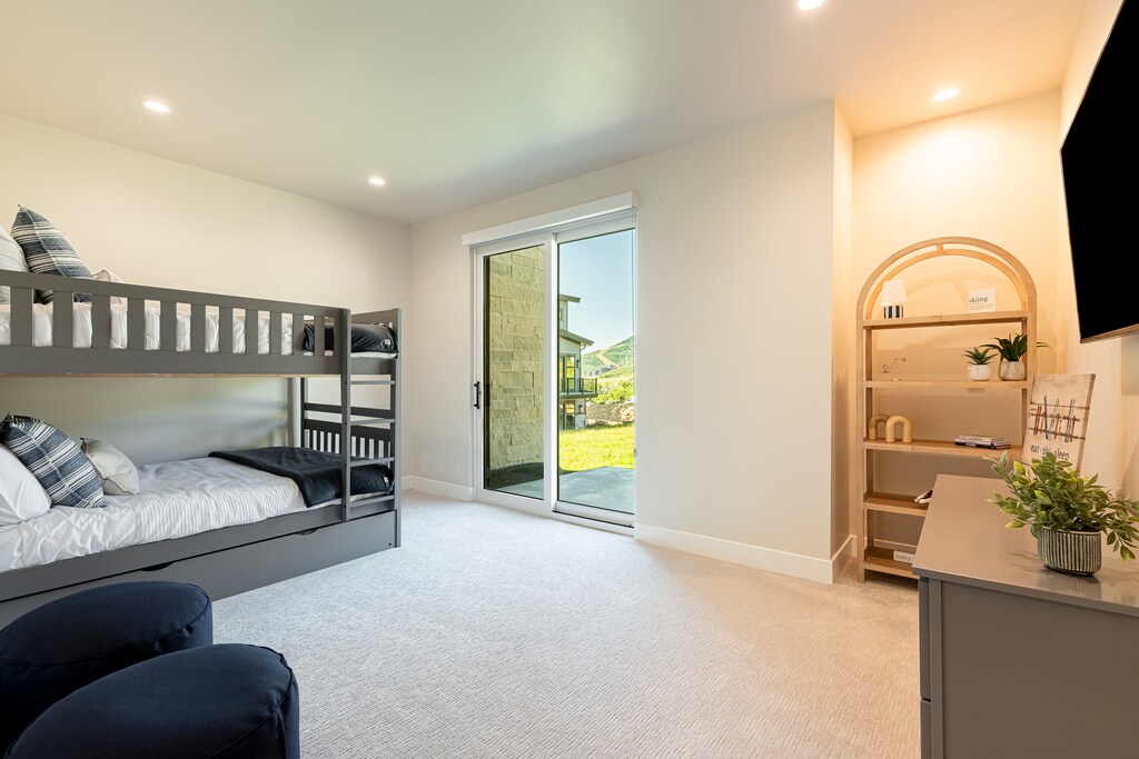 1st level bunk room with patio access
