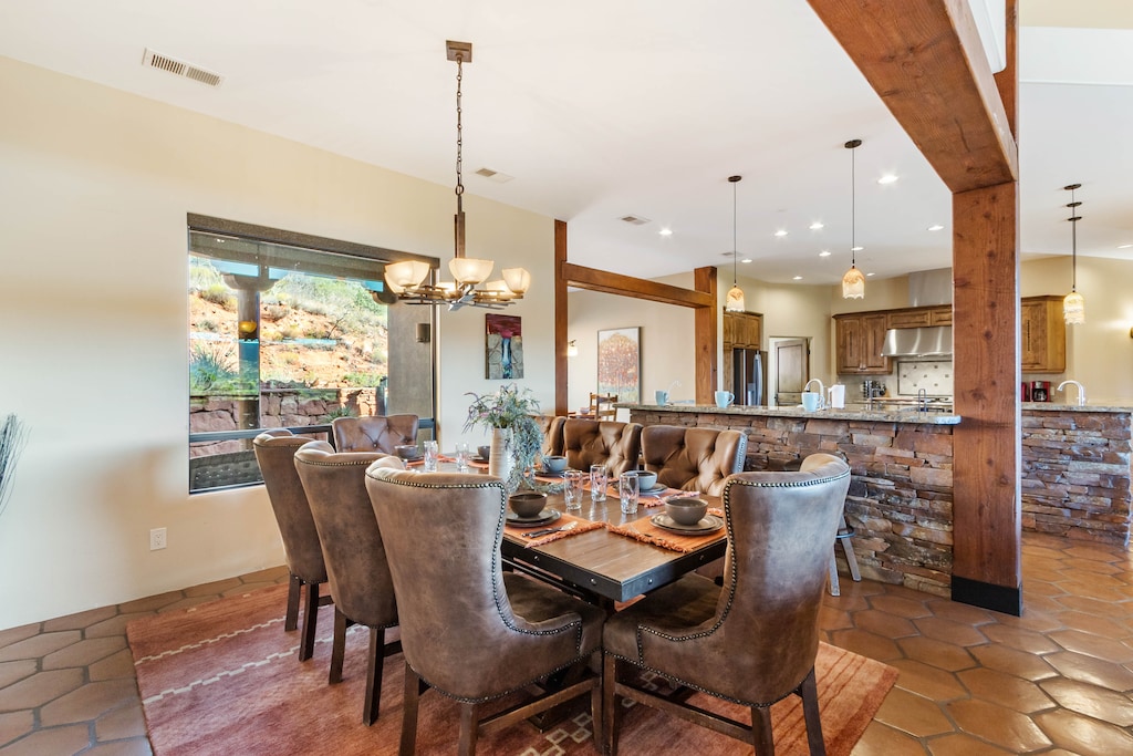 Dining area with seating for 8 and a 2nd island with seating for 3