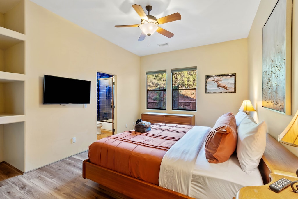 Guest bedroom 2 with a king bed and smart TV
