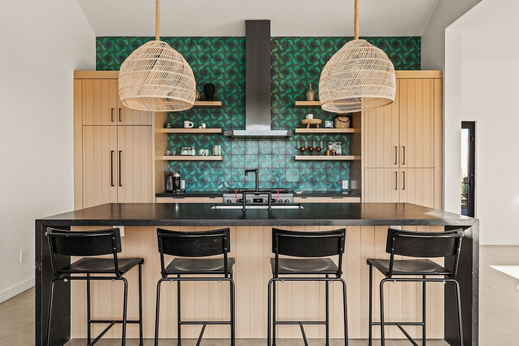 In the kitchen, the breakfast bar seats up to 4.