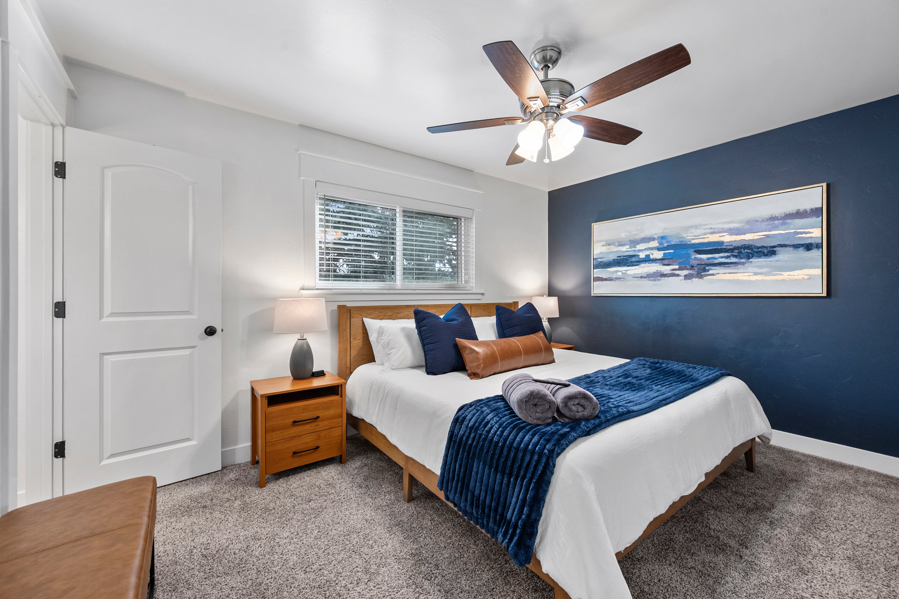 The spacious primary suite has a plush King Bed, premium linens and towels, and a private ensuite bathroom