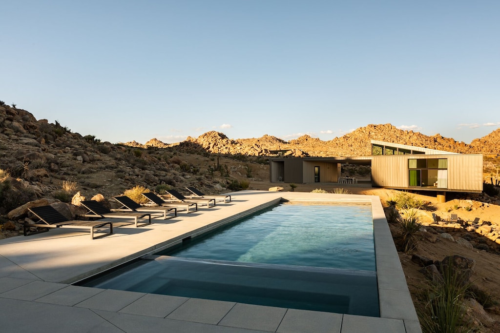 Swim in the desert shadows.