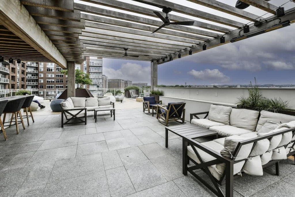 Social rooftop with scenic city view.