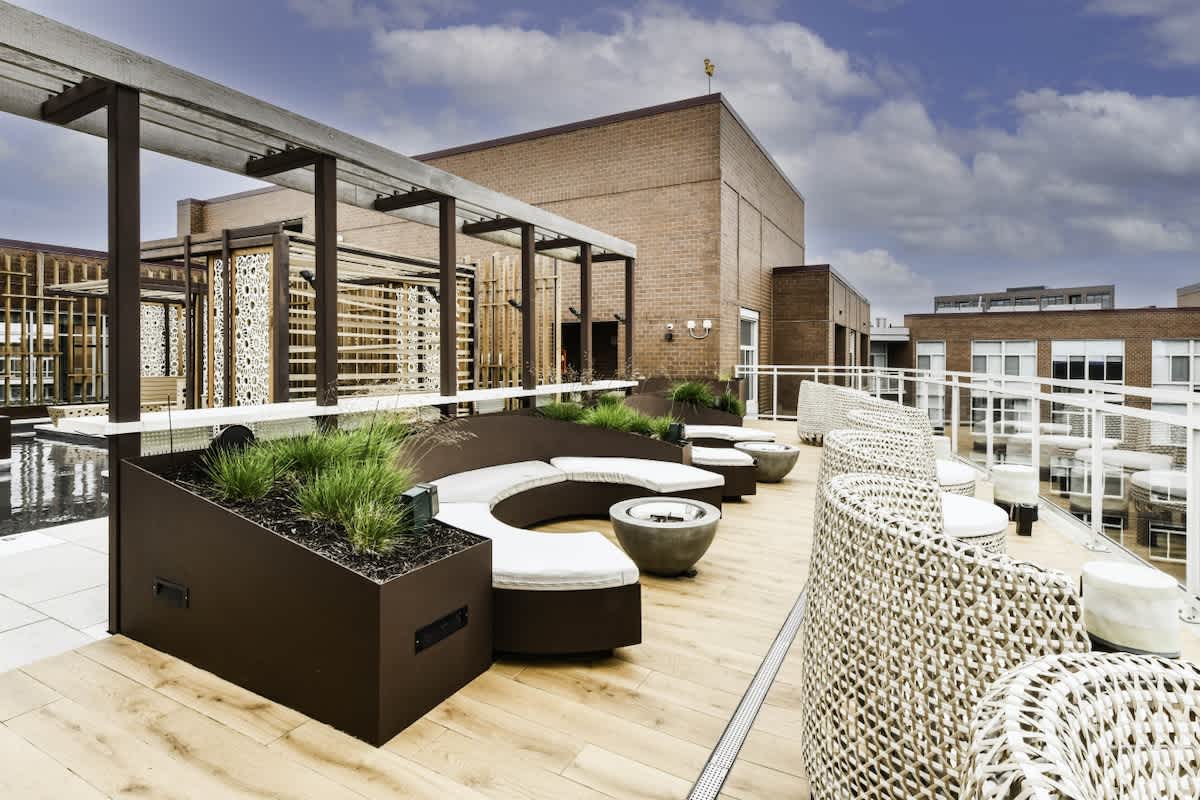 Social rooftop with scenic city view.