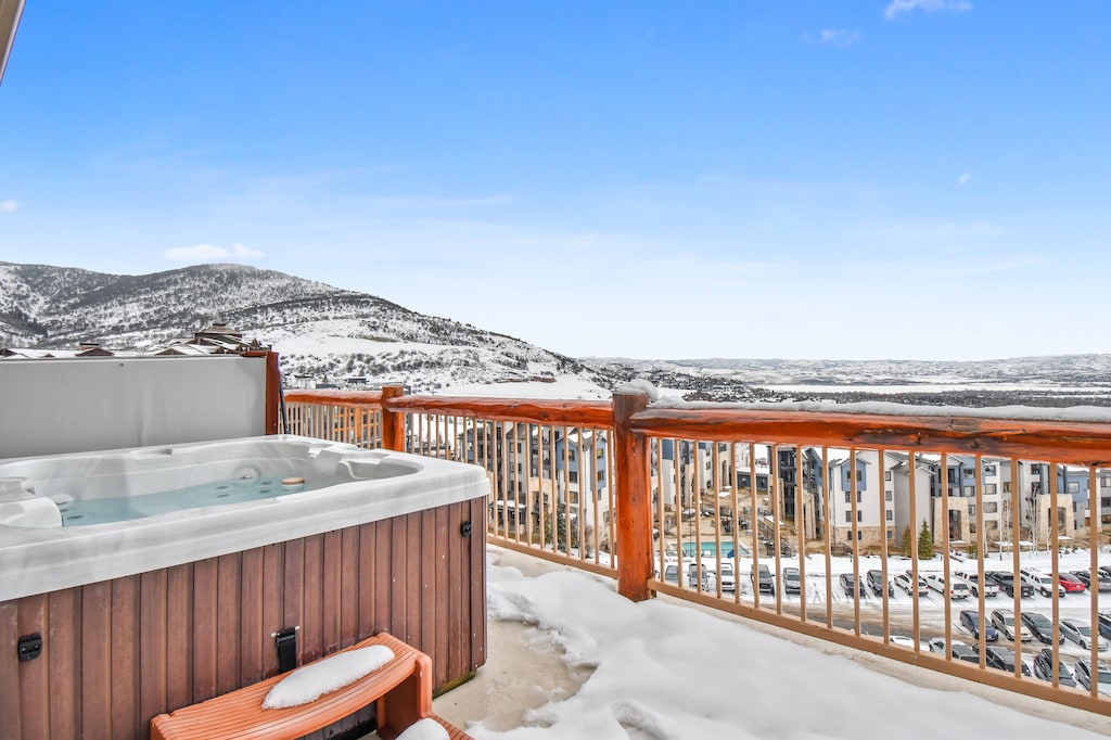 Private hot tub with mountain views.