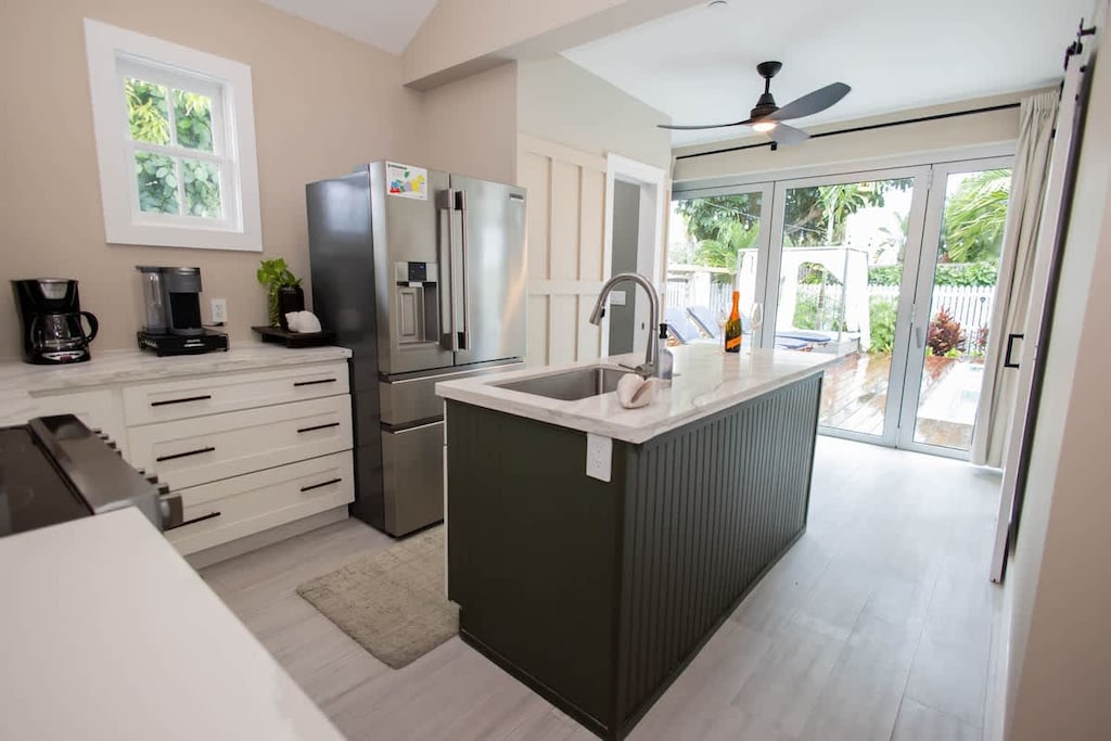 Kitchen with Pool and Amenities view