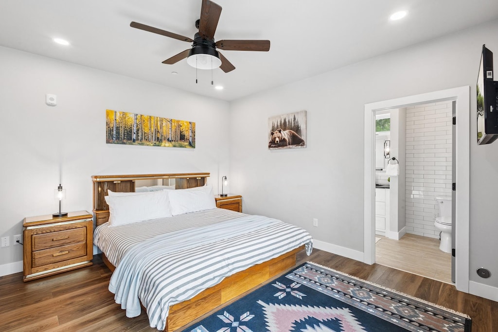 The primary King Bedroom features a Smart TV, overhead fan, and ensuite bathroom with a walk-in shower.