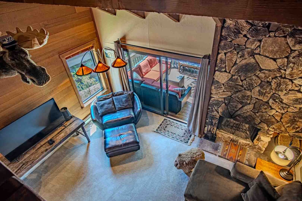 Vaulted ceilings and rock fireplace