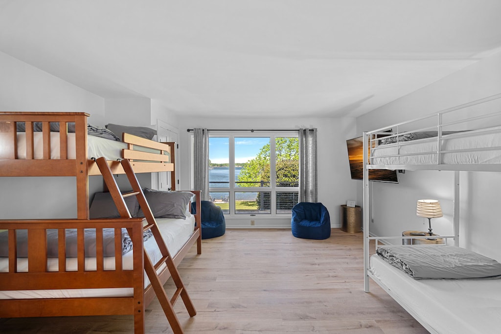 Bunk room with twin over full and twin over twin bunk bed.