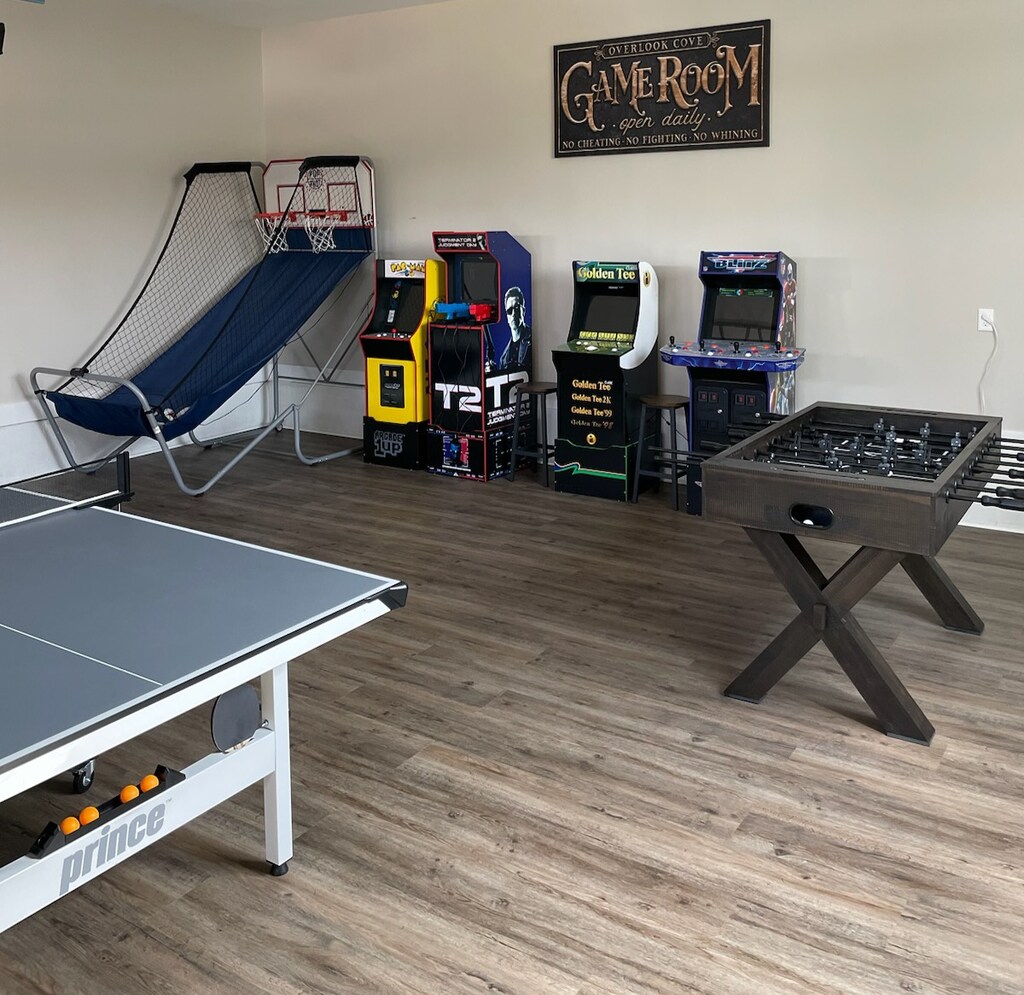 Garage converted game room: Pop-a-shot, Foosball, Ping Pong, Arcade Games.