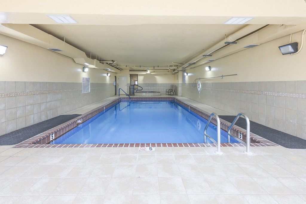 Relax in the indoor pool area at Phoenix IV in Orange Beach for a refreshing addition to your vacation experience