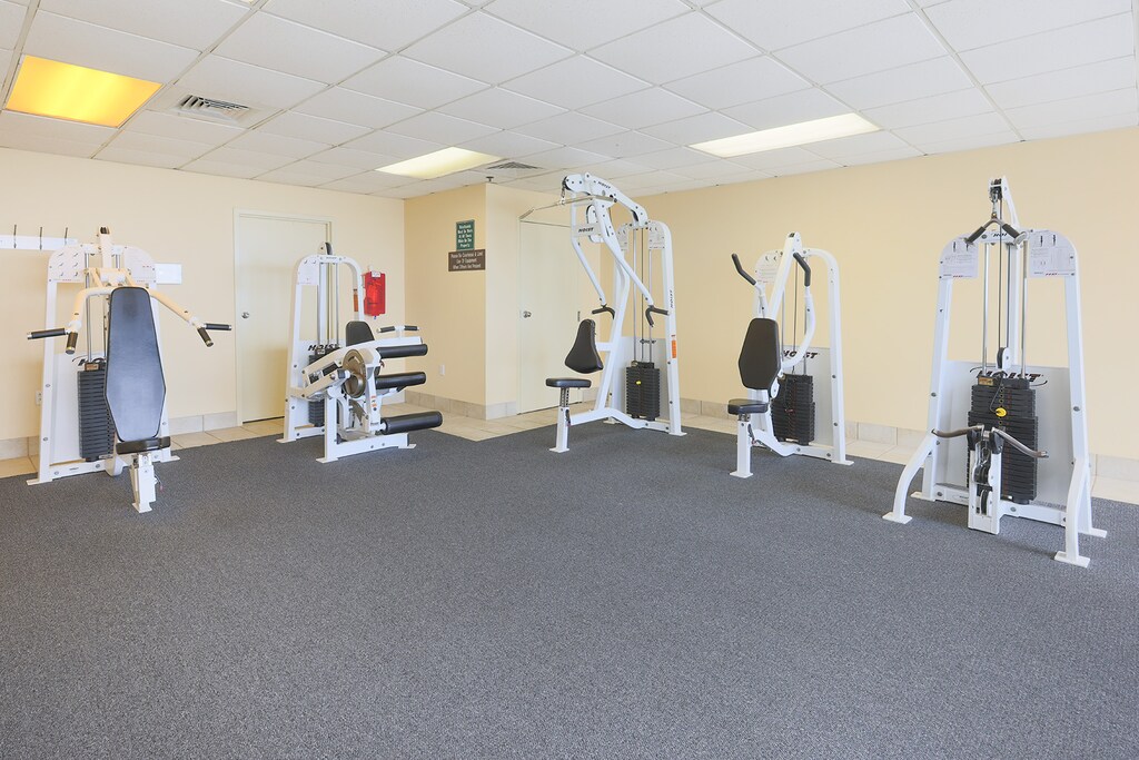 Stay active in the fitness center at Phoenix IV featuring various workout machines for a refreshing retreat experience