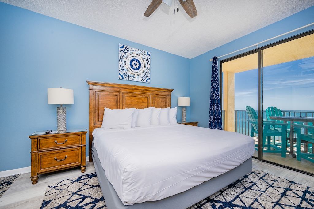The master suite features a king bed and beach balcony access with stunning views of the gulf waters