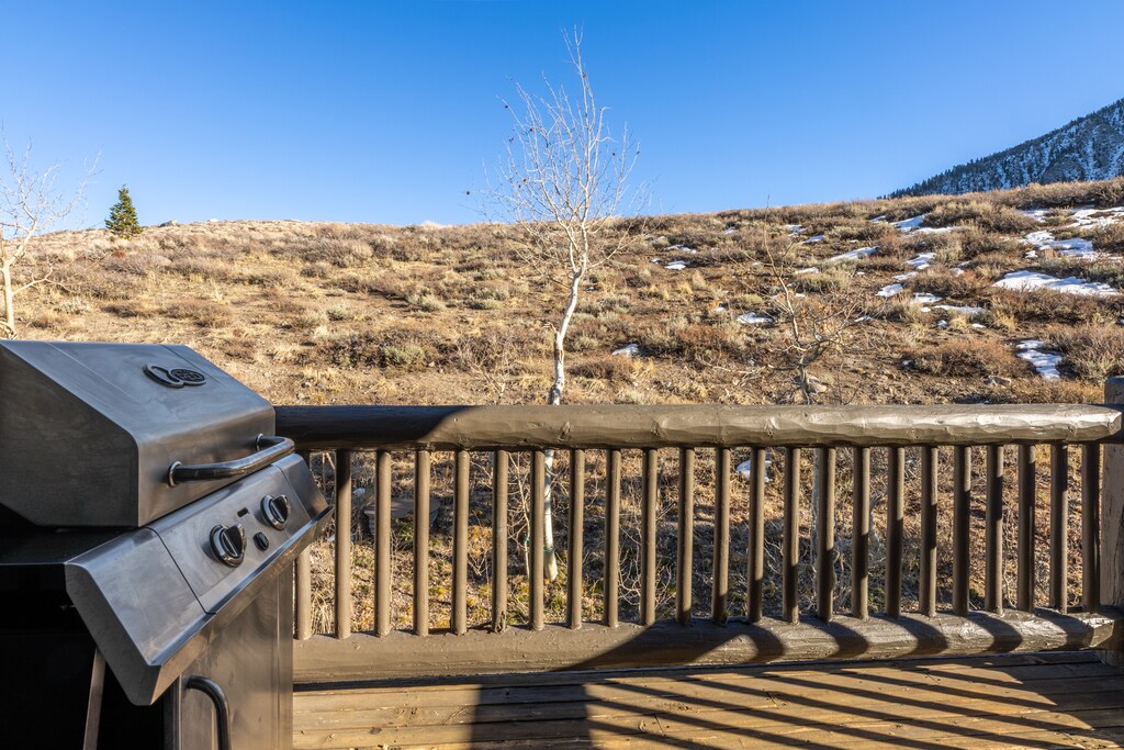 Fire up your BBQ on this spacious deck while soaking in stunning mountain views and crisp alpine air.