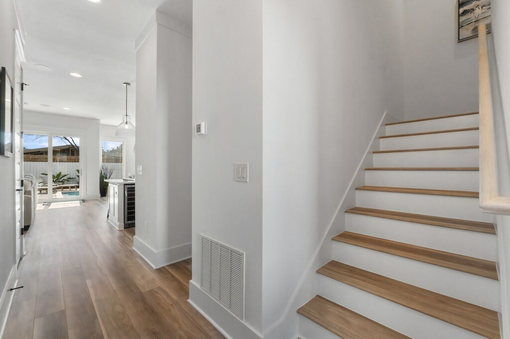 A bright entryway that leads straight to the poolside retreat.