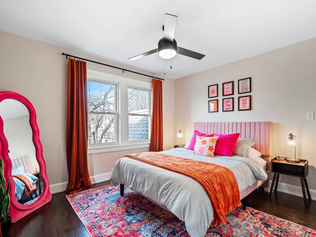 Cheerful bedroom w/ bright accents, cozy bed & playful decor for a restful stay