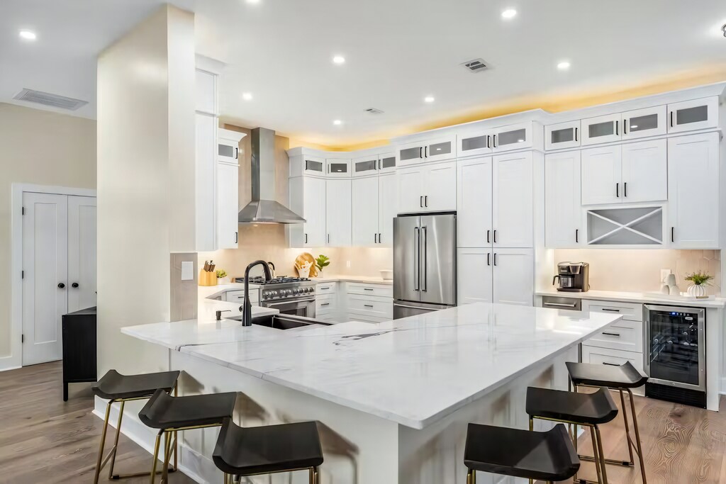 Created with function and style in mind, the kitchen features ample counter space and high-end stainless steel appliances.