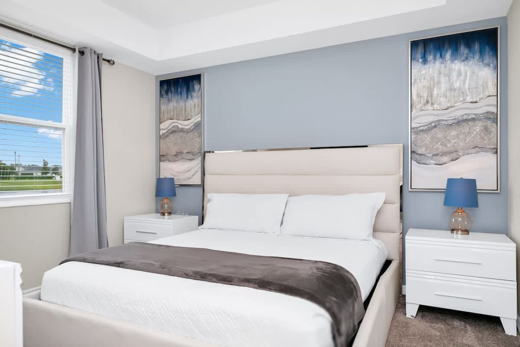 Sleep soundly in our spacious bedroom with premium linens and cloud-soft duvets.