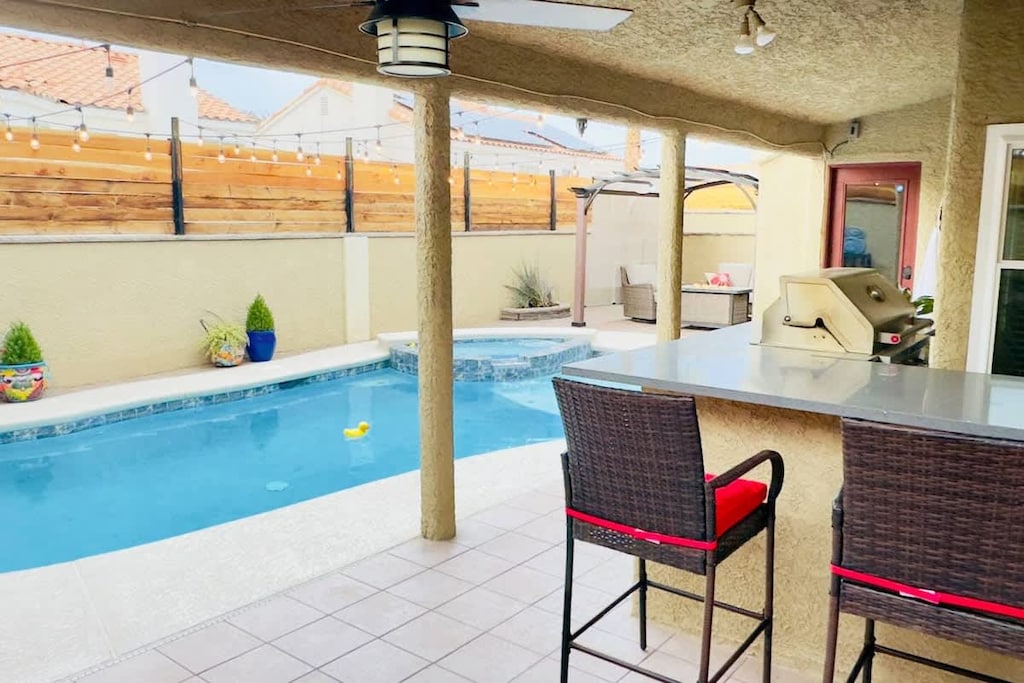 Private pool and jacuzzi for relaxing day or night.