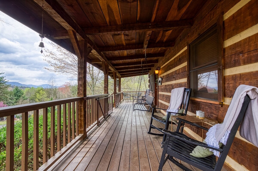 Porch: Revel in mountain views from this inviting space, perfect for morning coffee or evening chats!