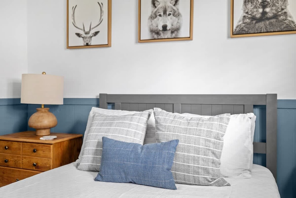 Rustic charm meets refined comfort in this inviting bedroom retreat.