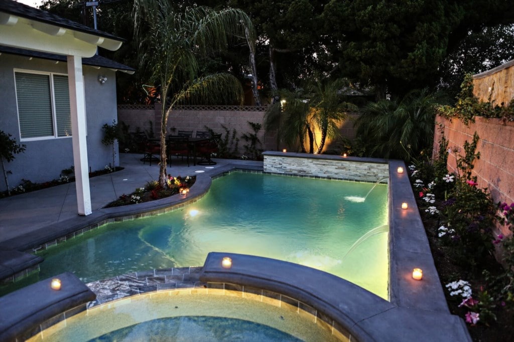 Beautiful In-ground Pool and Jacuzzi in the Evening