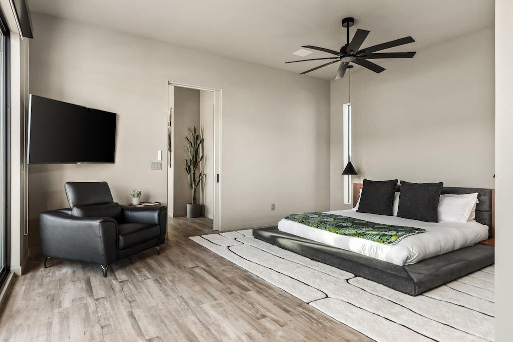 Primary bedroom features a television.