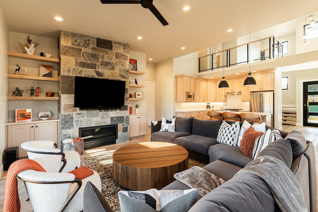 Living room with a gas fireplace and smart TV