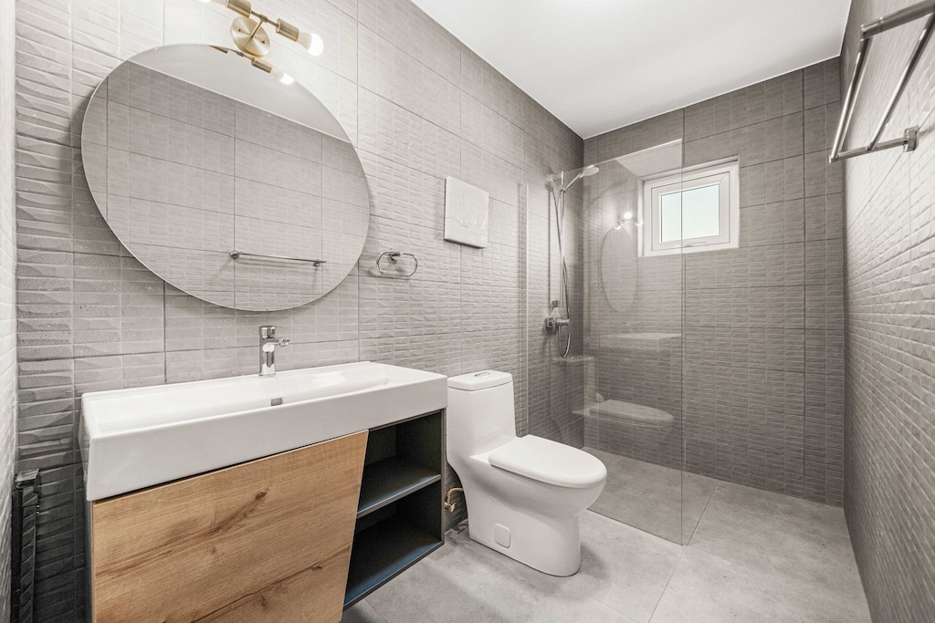 Bathroom 1 has a walk in shower